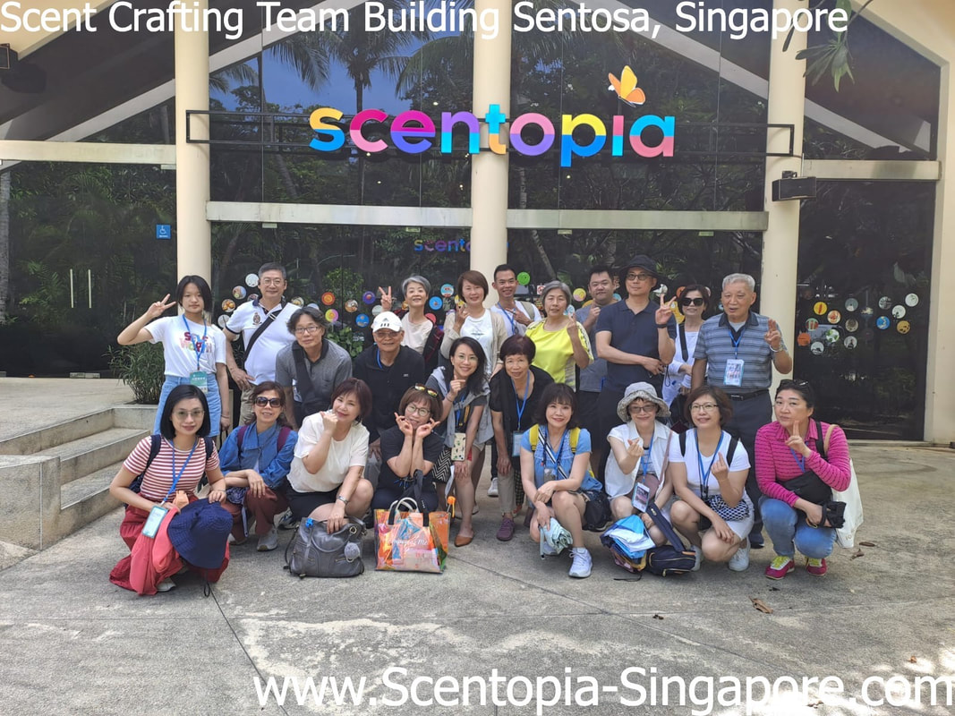 team photo after corporate event at scentopia