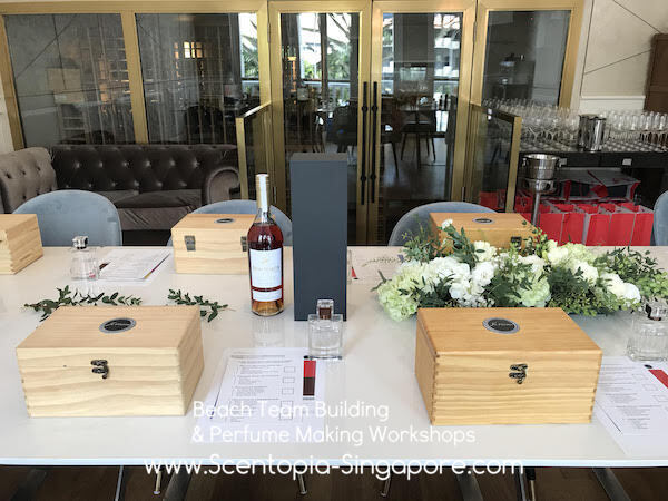 perfume kits on table for perfume bar