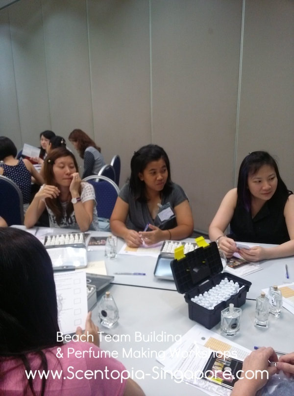 creative corporate team attending aromatherapy workshop