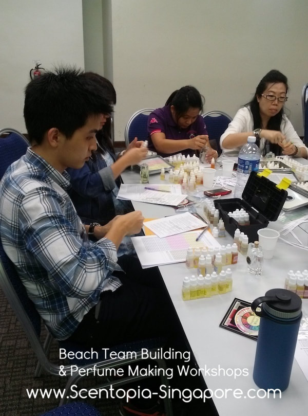 team crafting their orchid scent at scentopia