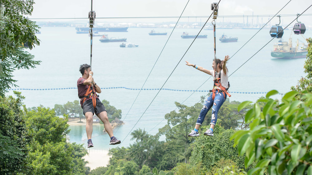 couple zipline at mega adventure sentosa singapore