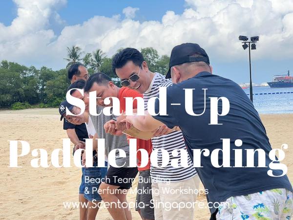 corporate employee at Stand-Up Paddleboarding team building