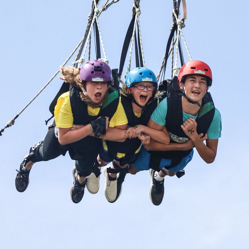 3 people having fun at SkyPark Sentosa by AJ Hackett singapore