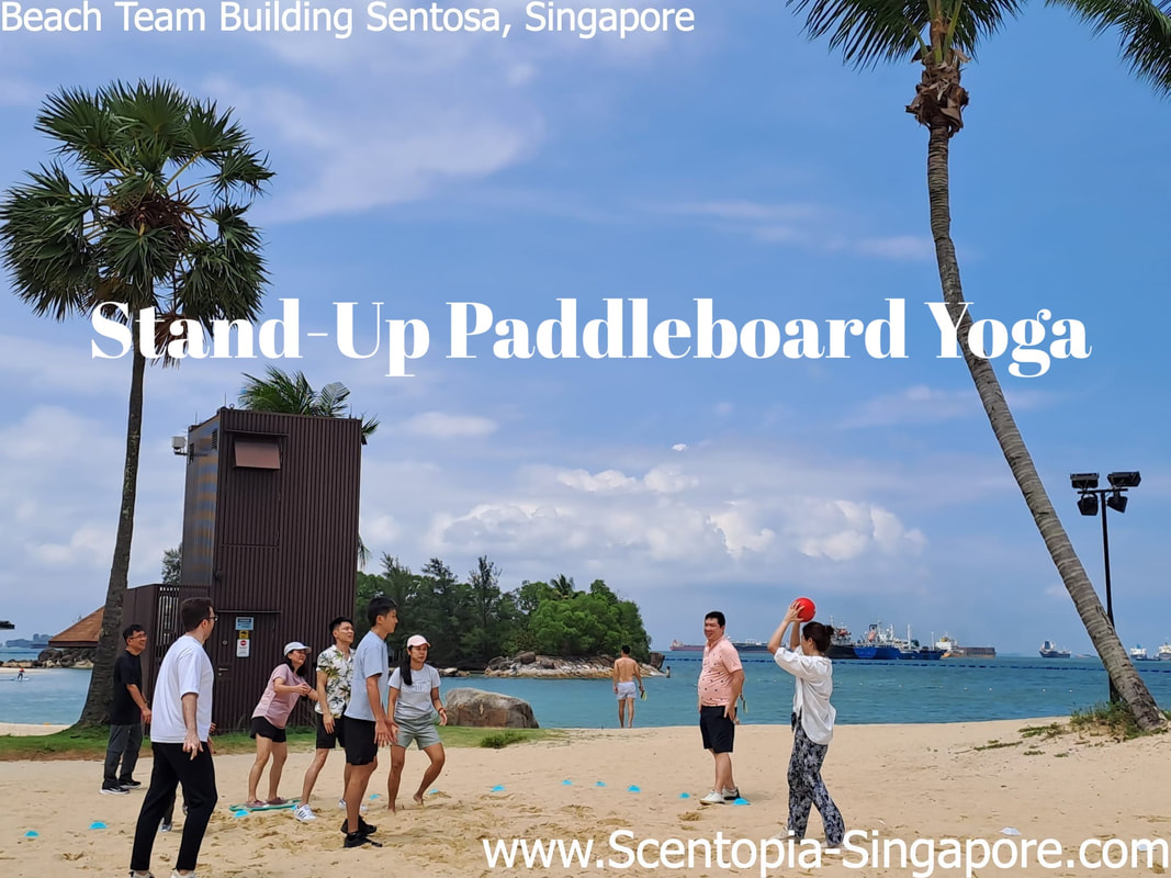 corporate employee at Stand-Up Paddleboard Yoga team building