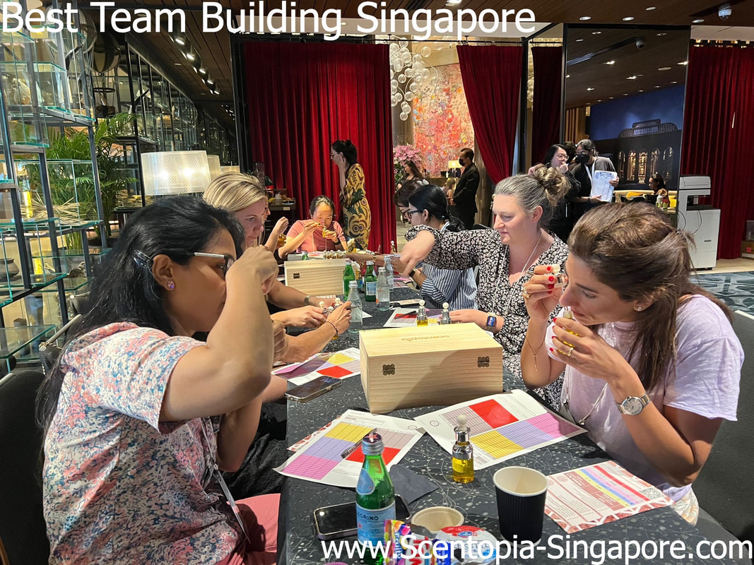 group of ladies making orchid scent at singapore