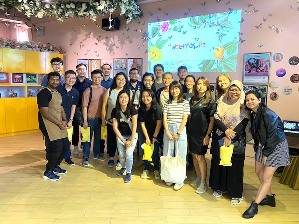 group photo after orchid aromatherapy Team Building Sentosa
