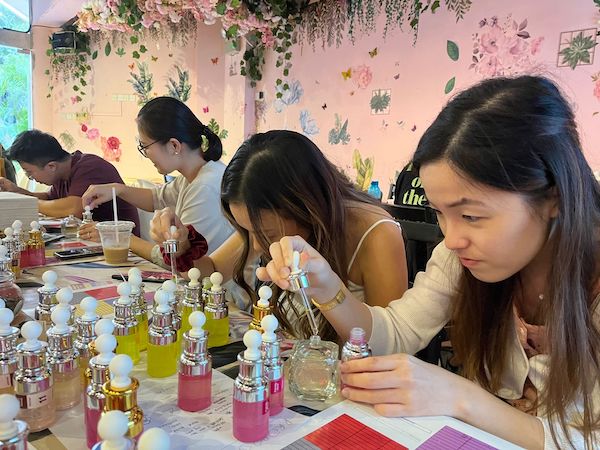 female crafting scent at orchid perfume Team Building sentosa